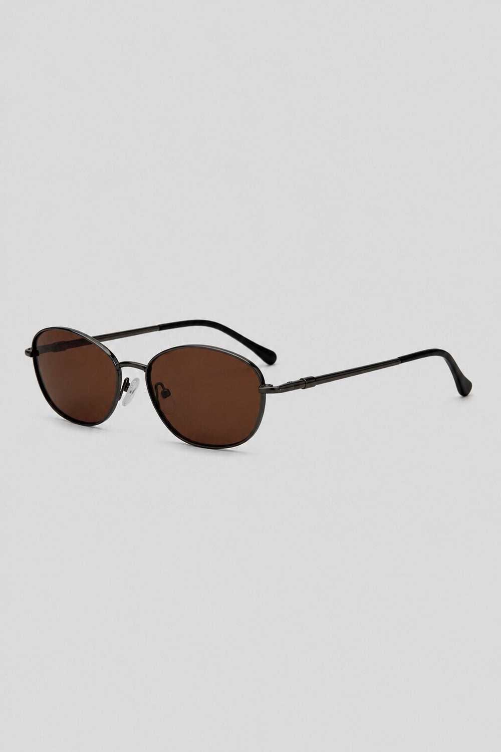 Olivier Marel Biarritz '94 in gold metal oval frame, three-quarter view