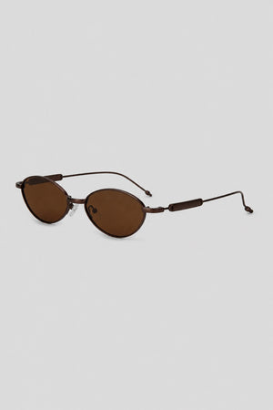 Olivier Marel Monaco '76 bronze polarized oval sunglasses, side profile, unisex fit
