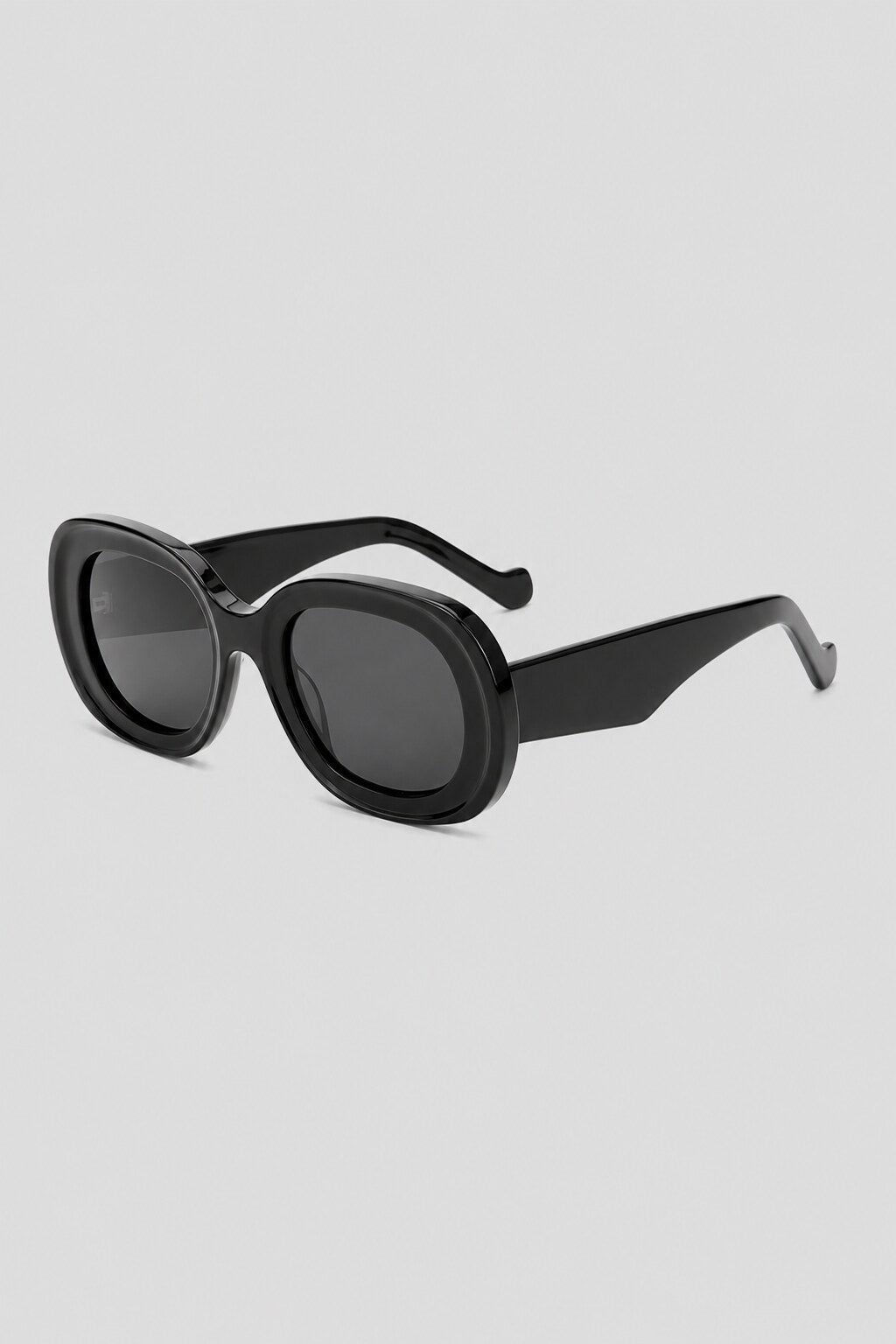 Olivier Marel Salzburg '68 black polarized oval sunglasses, side profile, women's fit